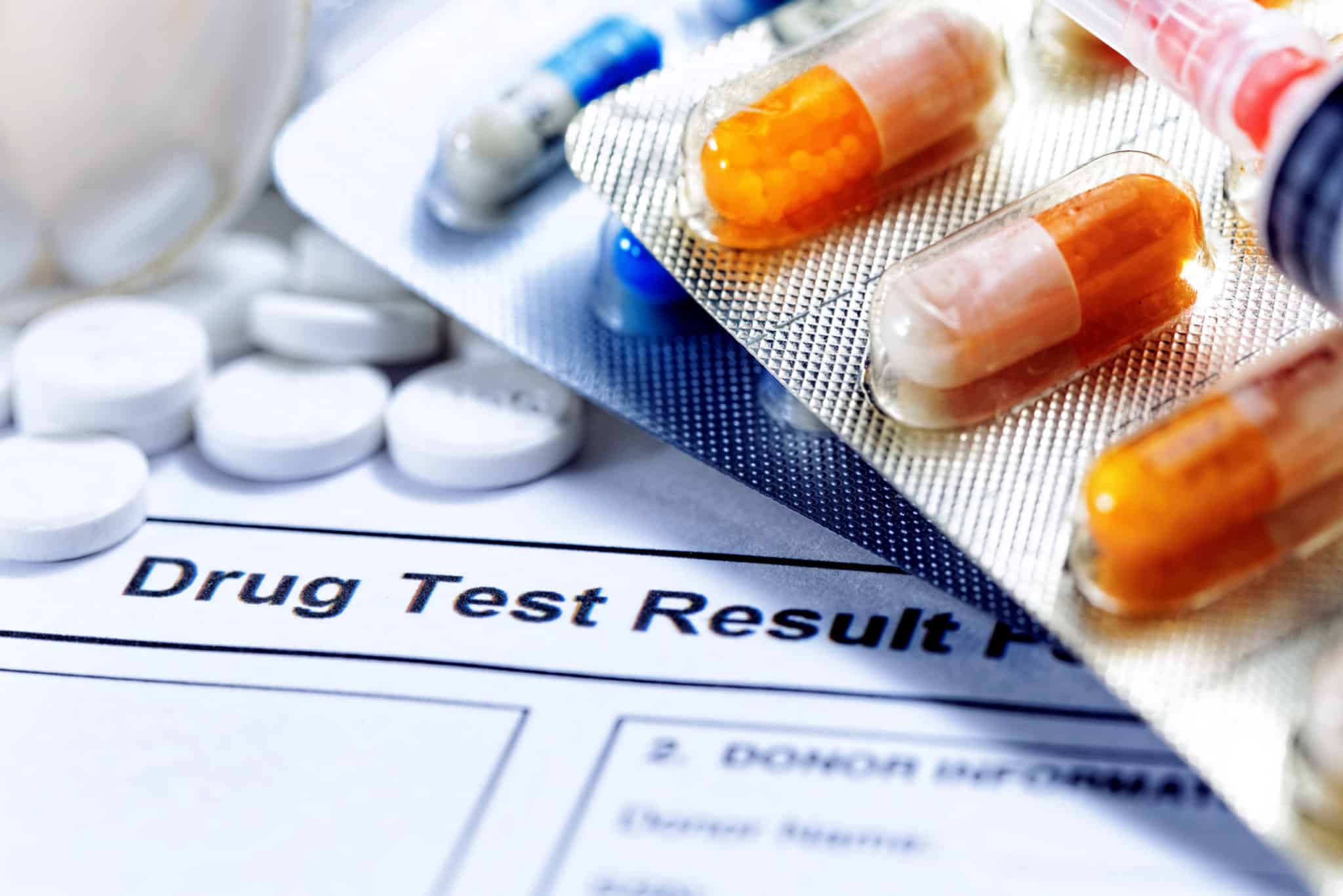 pills on drug test paperwork