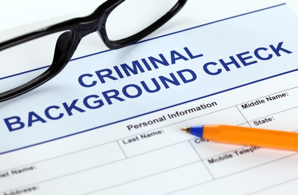 criminal background check form pen glasses