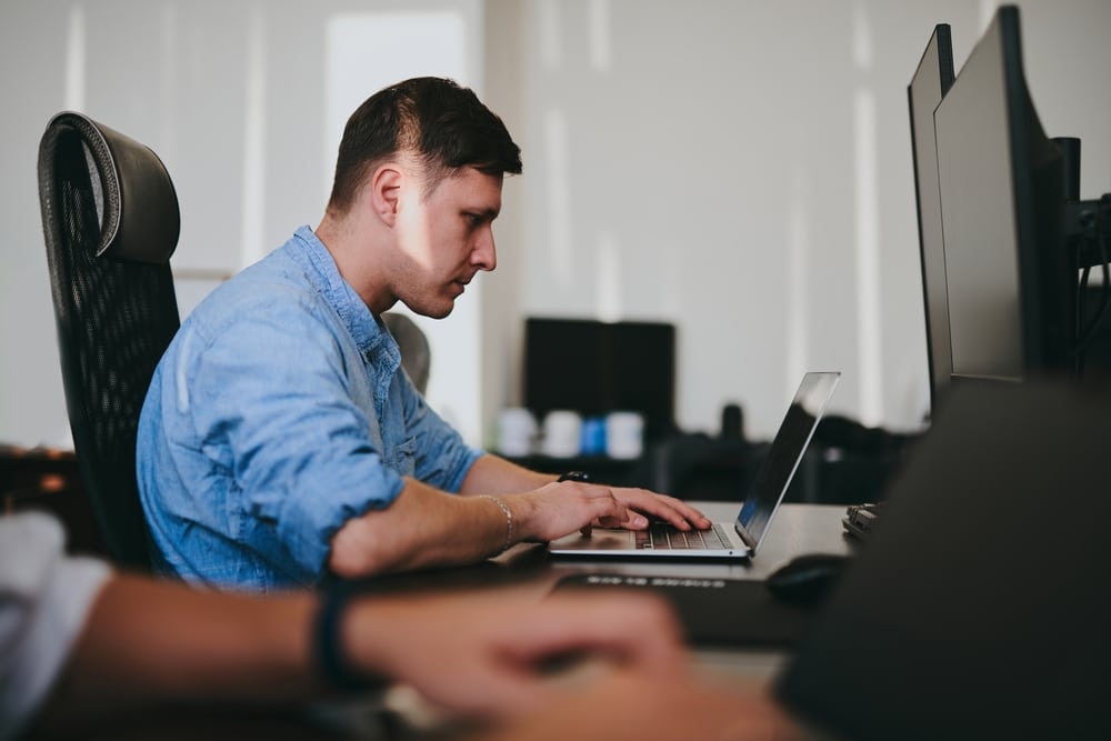 man on computer