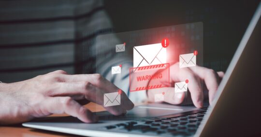 man using computer scam email graphics
